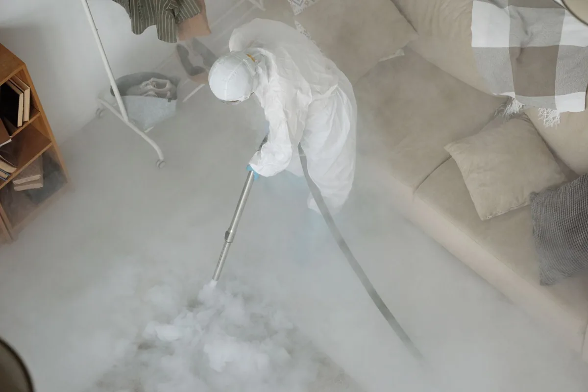 Biohazard cleanup technician in protective equipment, Ohio City, Cleveland, OH